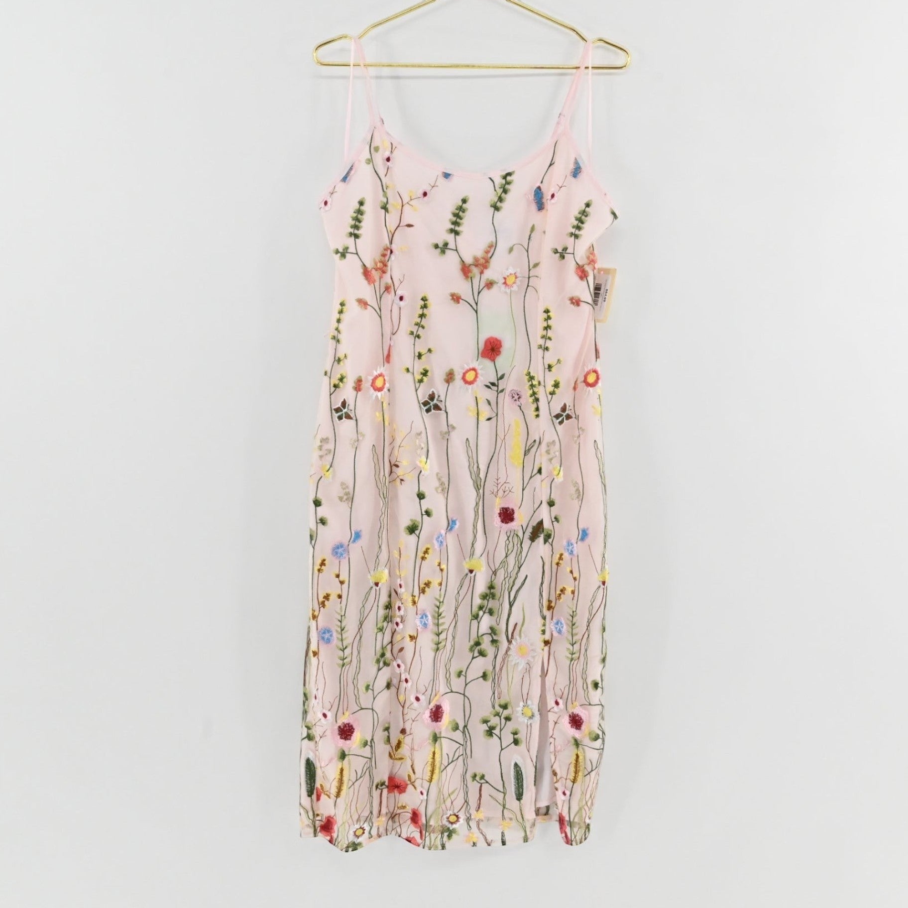 Lynn's Closet Boutique Sam Edelman pink midi dress with colorful floral embroidery, spaghetti straps, and side slit.