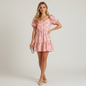 Lynn's Closet Boutique LoveShackFancy for Target pink floral mini dress with puff sleeves and square neckline on model