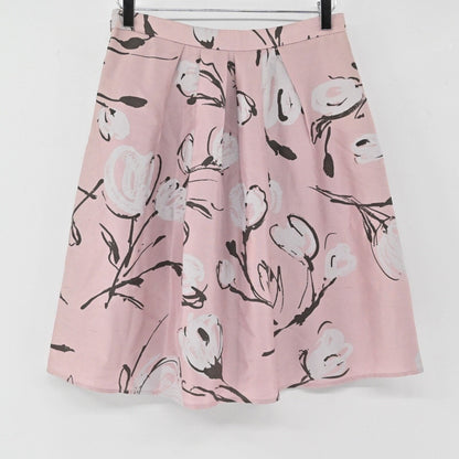 Lynn's Closet Boutique Moschino Cheap and Chic pink silk A-line skirt with artistic floral print and pleats.