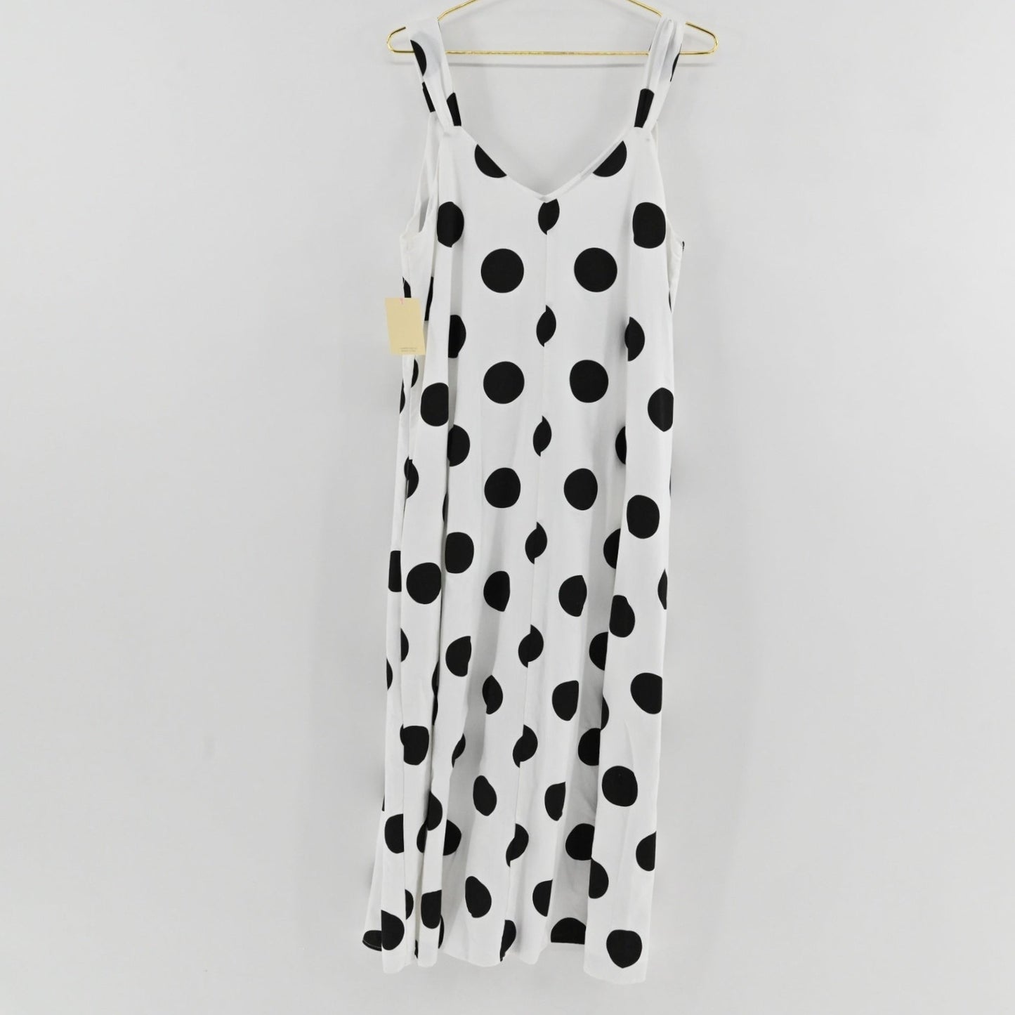 Lynn's Closet Boutique Pomander Place white midi dress with black polka dots, sleeveless V-neck, size XL.