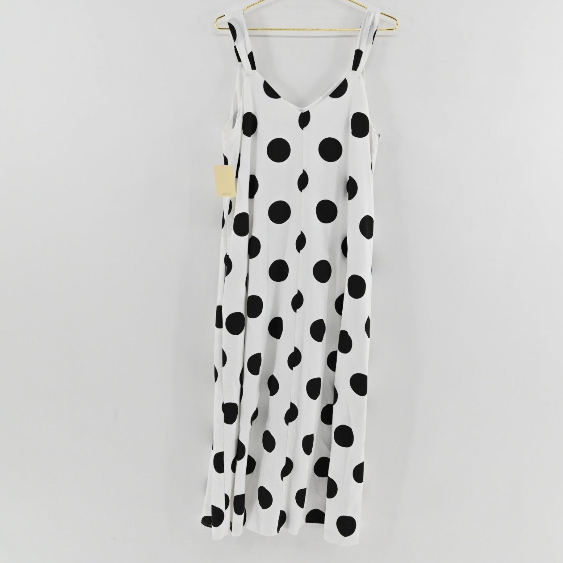 Lynn's Closet Boutique Pomander Place white midi dress with black polka dots, sleeveless V-neck, size XL.