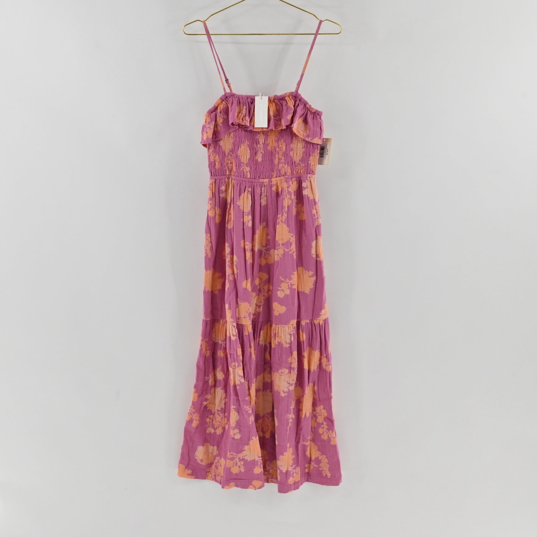 Lynn's Closet Boutique Z Supply purple midi dress with orange floral print, smocked bodice, and ruffled neckline.
