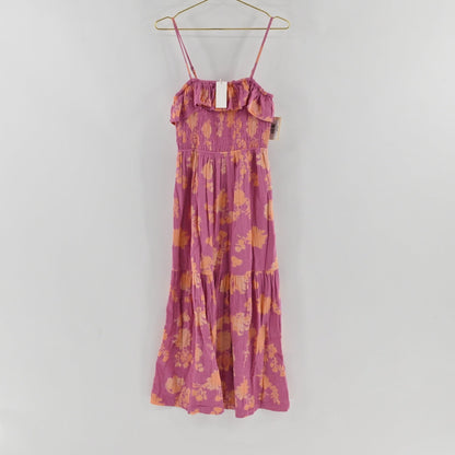 Lynn's Closet Boutique Z Supply purple midi dress with orange floral print, smocked bodice, and ruffled neckline.