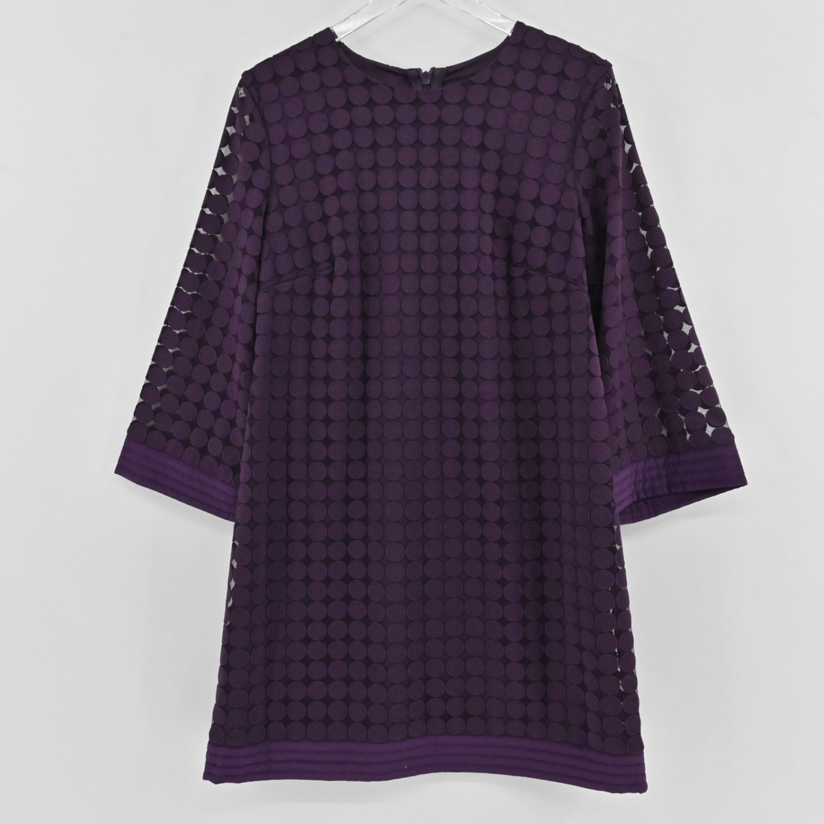 Lynn's Closet Boutique Trina Turk purple mini dress with geometric circle overlay and three-quarter length sleeves.
