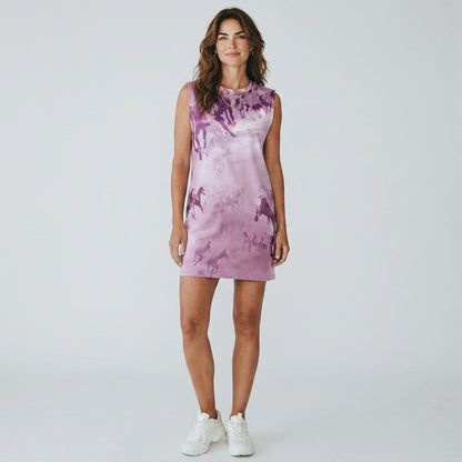 A model wearing a Lynn's Closet Boutique AllSaints sleeveless mini dress in purple with an ethereal horse print.