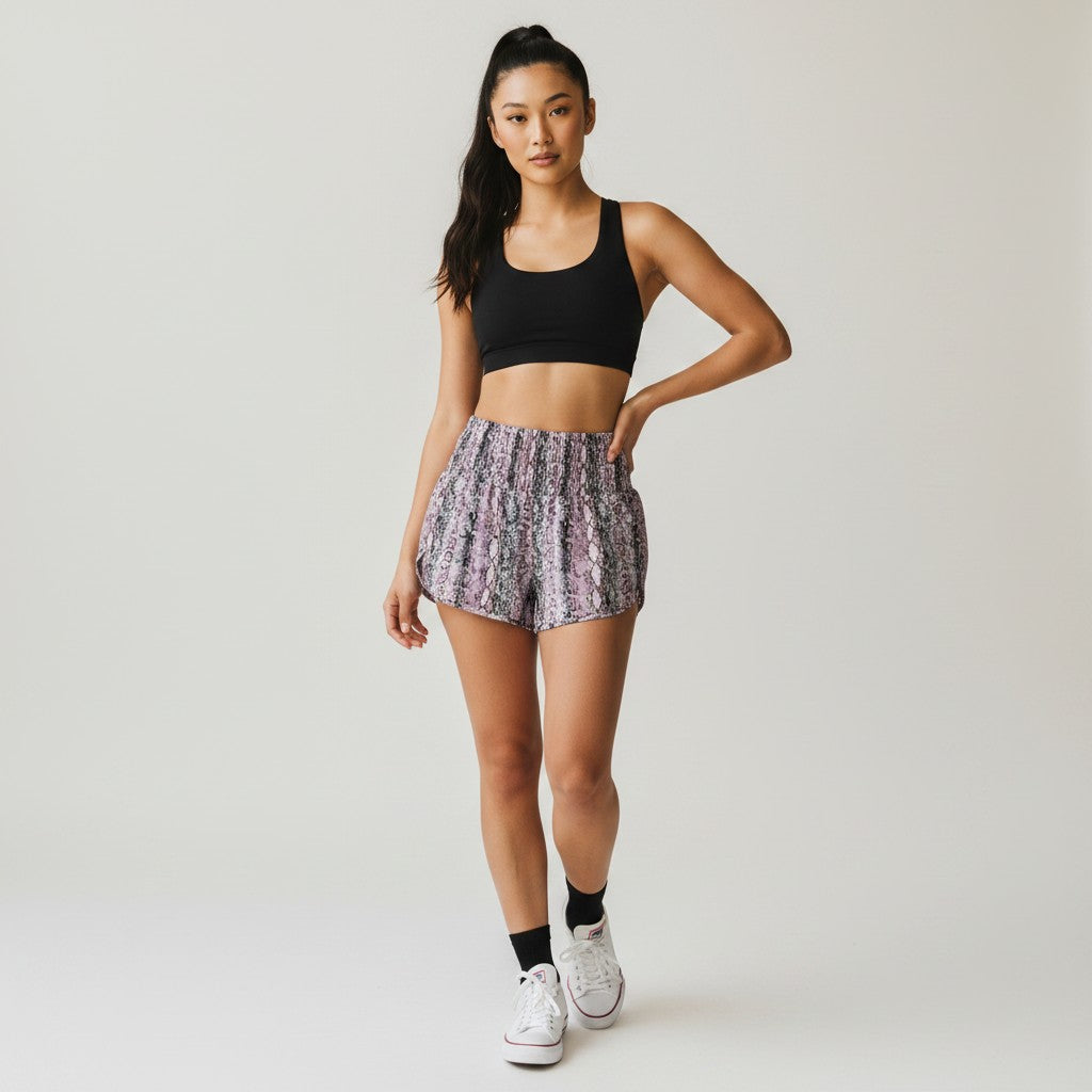 Lynn's Closet Boutique purple snake print shorts with elastic waist and ruffled hem, size M.