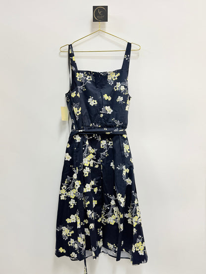 Lynn's Closet Boutique Rachel Roy navy floral dress with square neckline, adjustable straps, and matching waist belt.