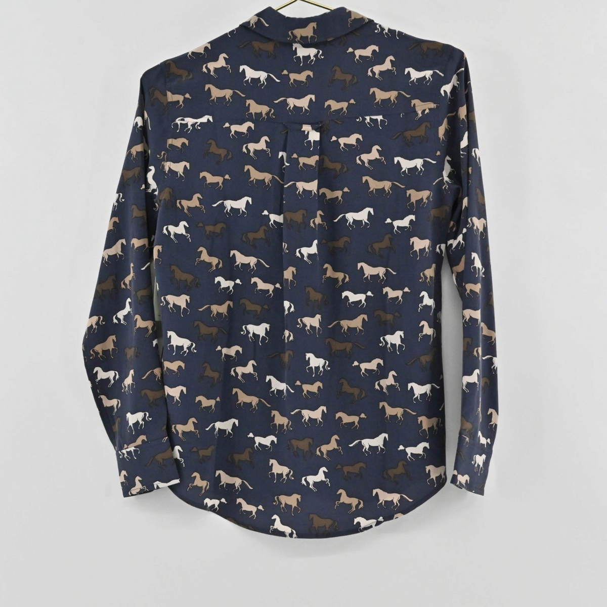 Lynn's Closet Boutique Rails Kate navy silk button-down shirt with a whimsical horse print, back view.