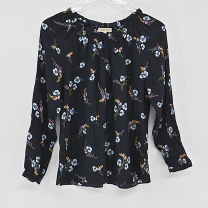 Lynn's Closet Boutique Rebecca Taylor black silk top with multi-colored floral print, gathered neck, and smocked cuffs.