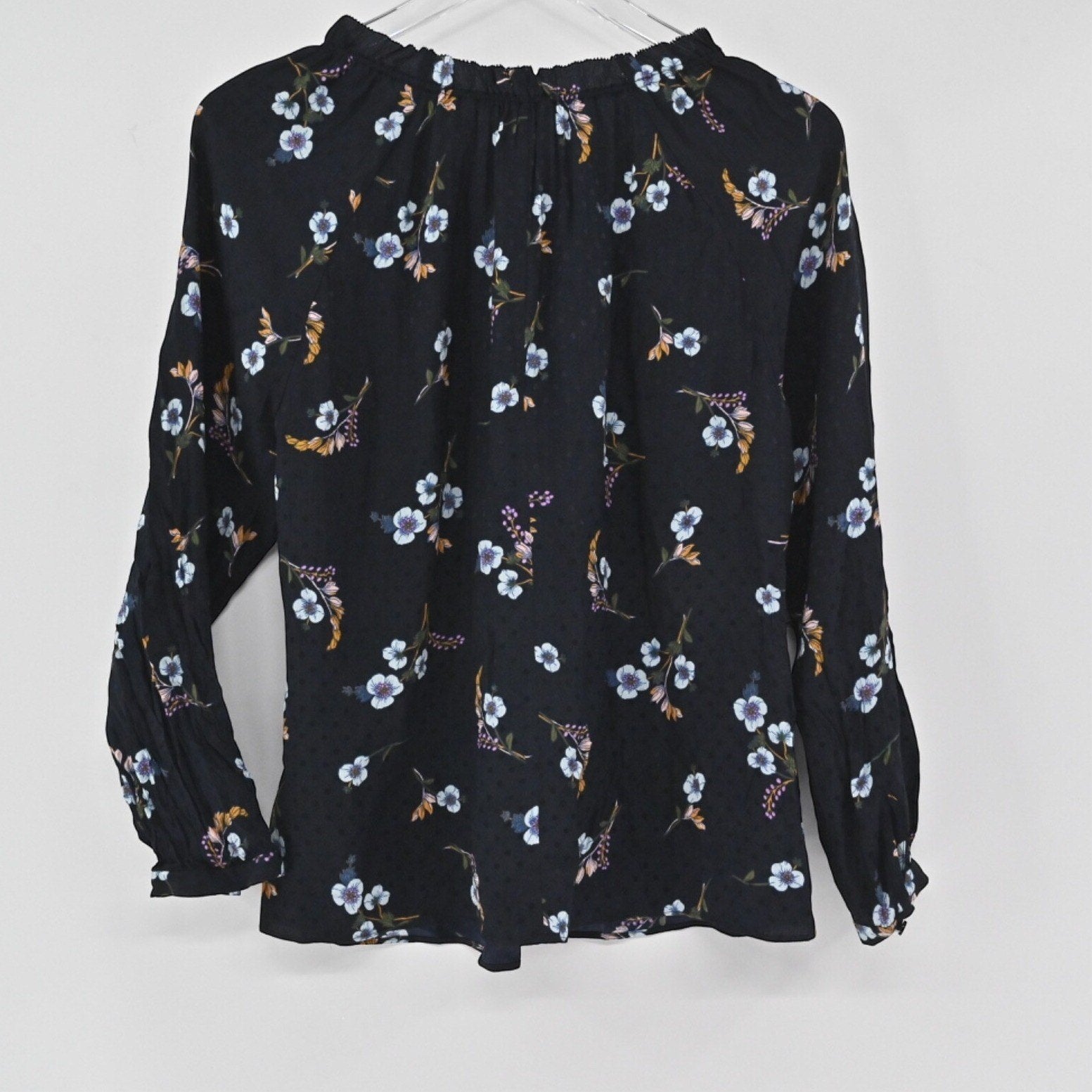Lynn's Closet Boutique Rebecca Taylor black silk top with multi-colored floral print, gathered neckline, and smocked cuffs