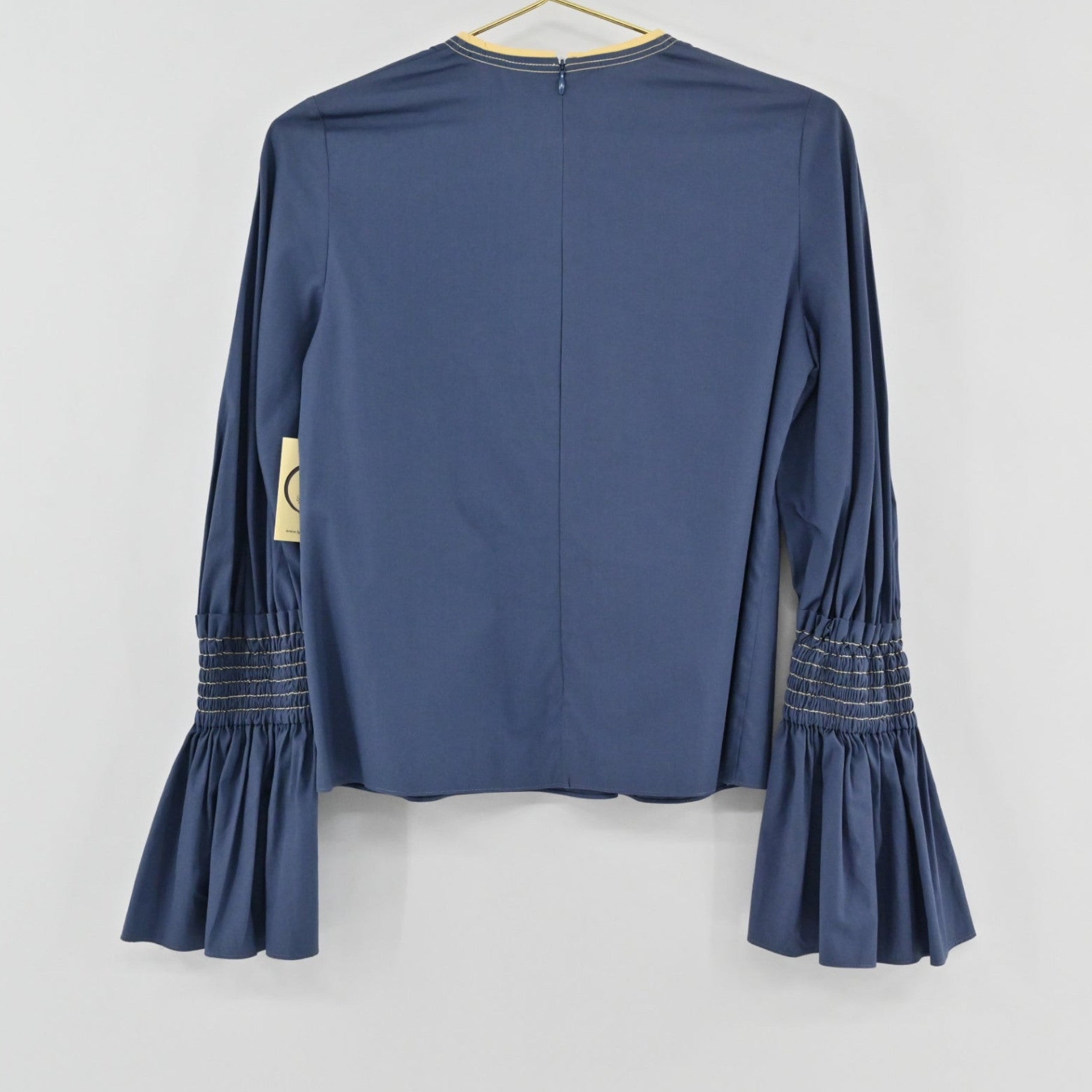 Lynn's Closet Boutique Roksanda blue cotton top with voluminous bell sleeves and smocked forearm detailing