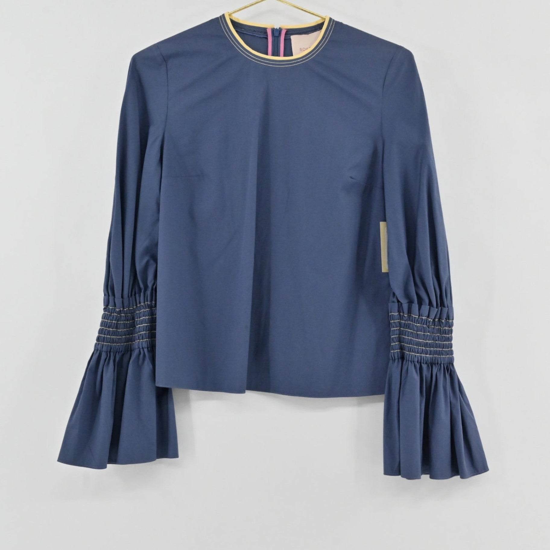 Lynn's Closet Boutique Roksanda blue cotton top with voluminous bell sleeves and smocked forearm detailing.
