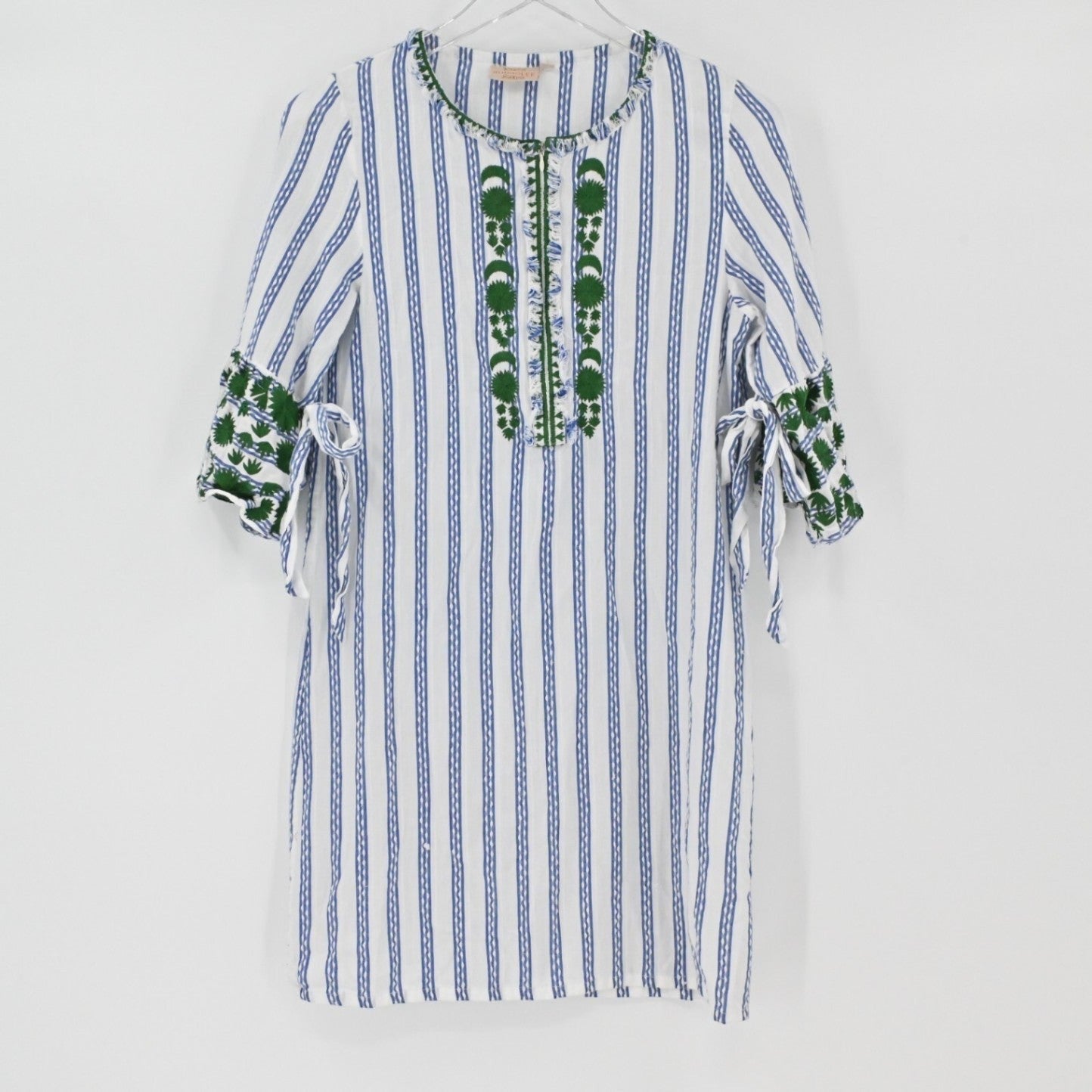 Lynn's Closet Boutique Rungolee shift dress with blue vertical stripes, green embroidery, and tie-sleeve cuffs.