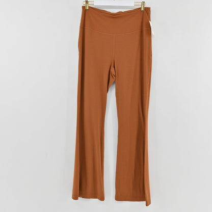 Lynn's Closet Boutique Lululemon high-rise rust colored flared yoga pants in soft sweat-wicking fabric
