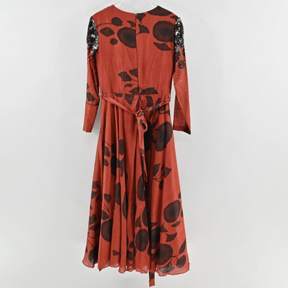 Lynn's Closet Boutique rust and black floral maxi dress with beaded sequin shoulders and a waist tie, back view.