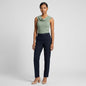 Lynn's Closet Boutique Alice + Olivia sage green sleeveless ribbed top with a cowl neckline worn by a model