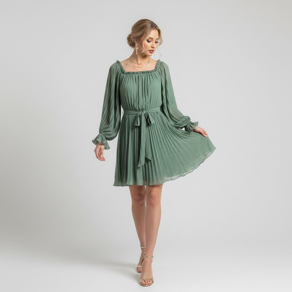 Lynn's Closet Boutique sage green pleated mini dress with square neckline, long puff sleeves, and tie waist.
