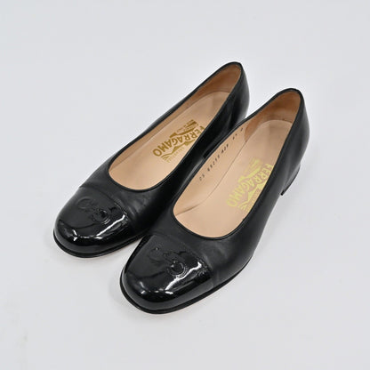 Lynn's Closet Boutique Salvatore Ferragamo black leather pumps with patent cap toe and Gancini logo, low block heel.