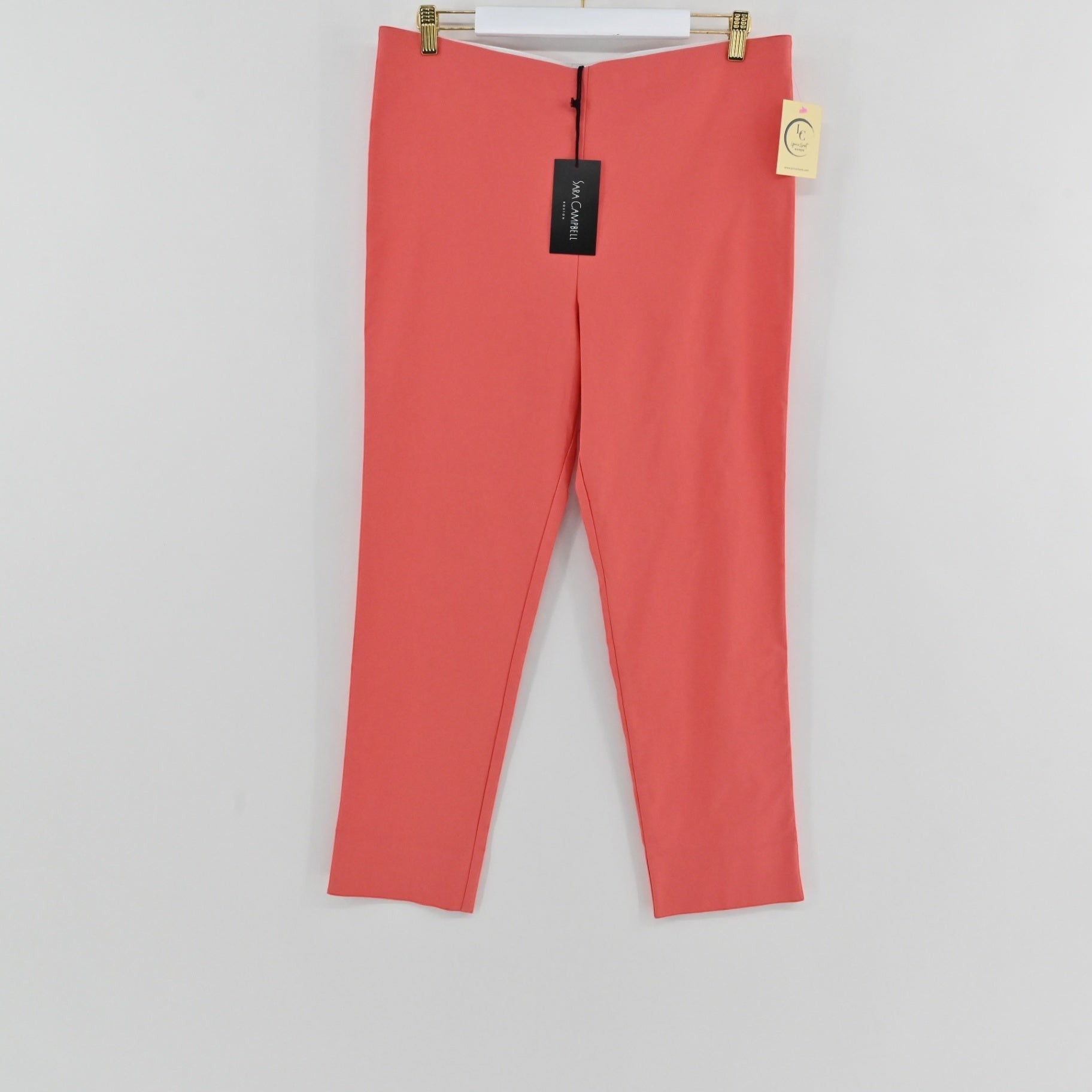 Lynn's Closet Boutique Sara Campbell coral tailored pants with a clean front and hem slit, size XL, new with tags.