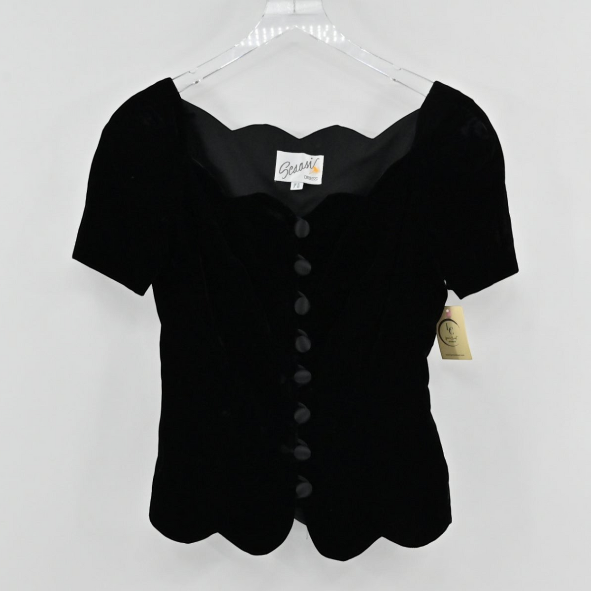 Lynn's Closet Boutique vintage 80s Scaasi black velvet jacket with a scalloped neckline and fabric-covered buttons.