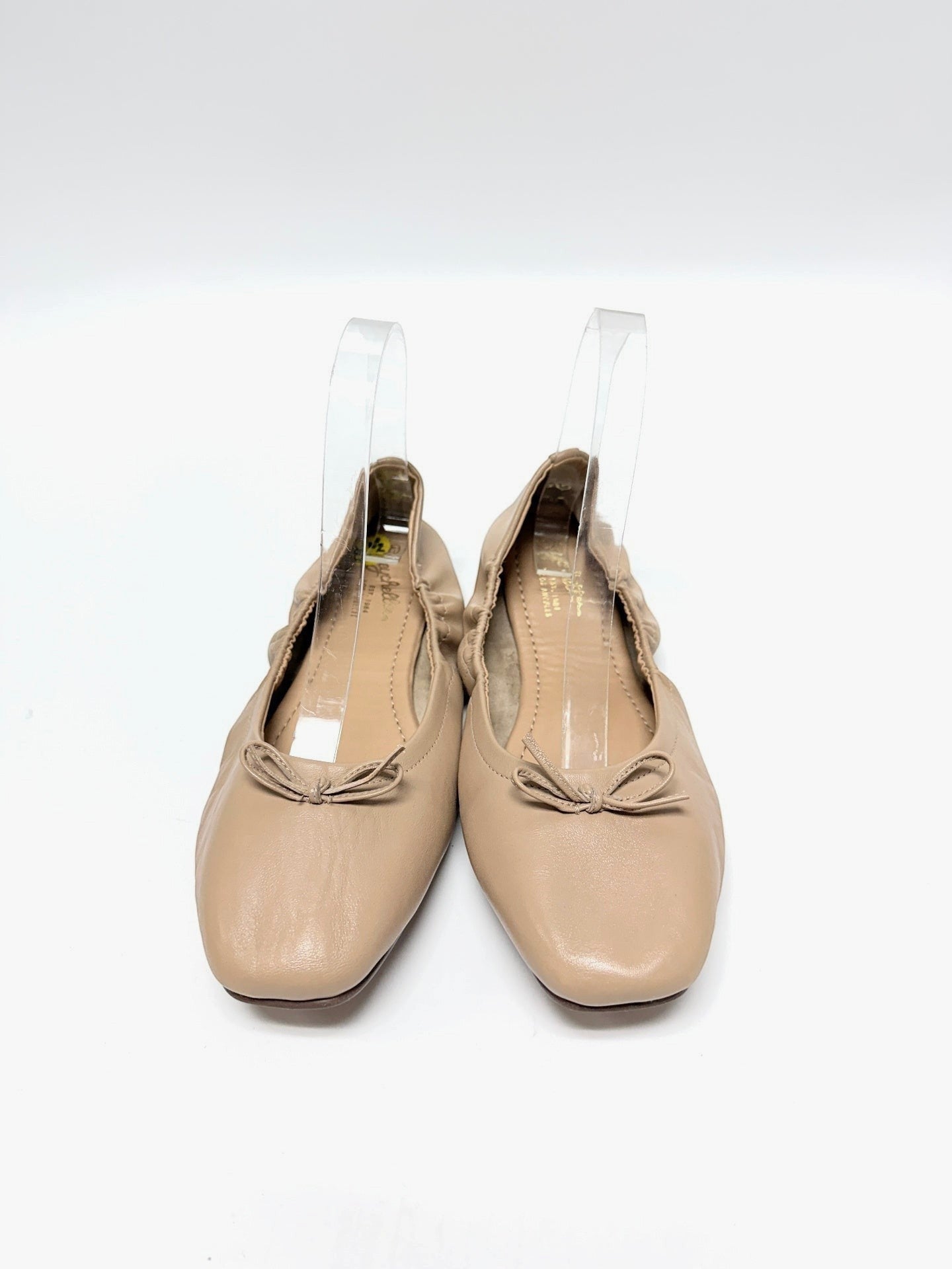 Seychelles beige leather ballet flats with bow detail and elasticized topline from Lynn's Closet Boutique.