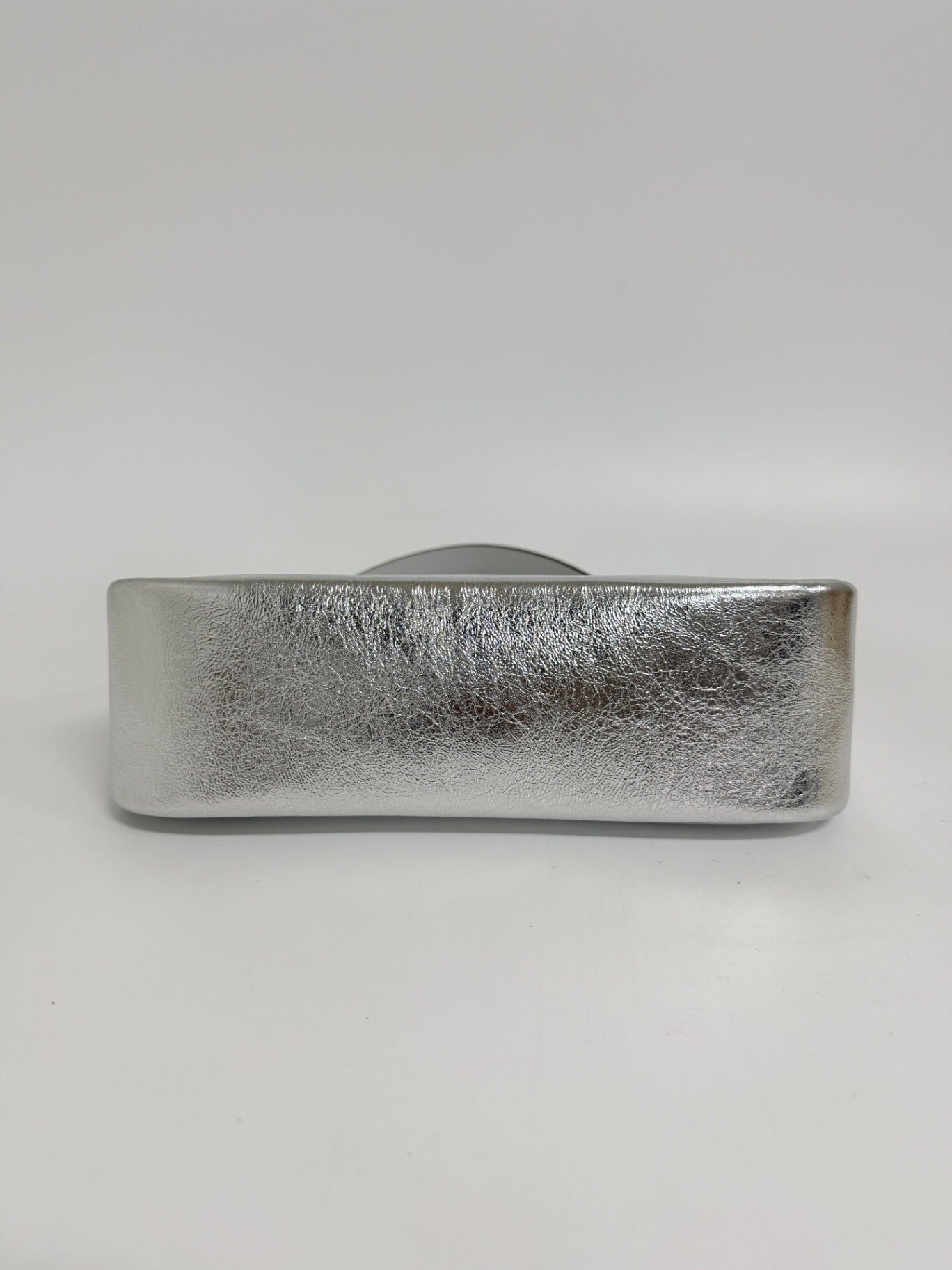 Lynn's Closet Boutique Kate Spade silver metallic crinkle leather handbag base view showing flat bottom