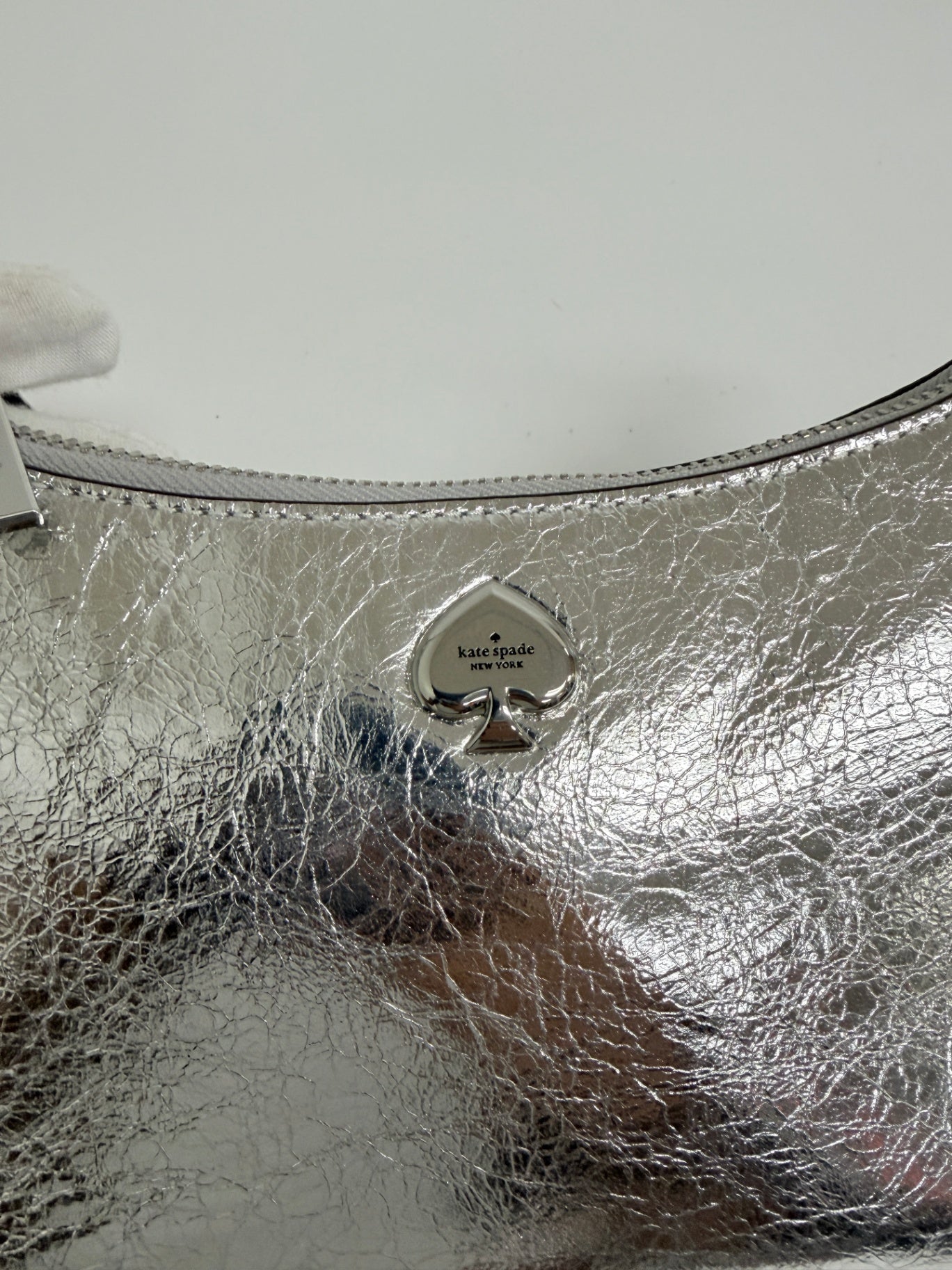 Lynn's Closet Boutique Kate Spade silver crinkle metallic handbag with signature spade logo hardware