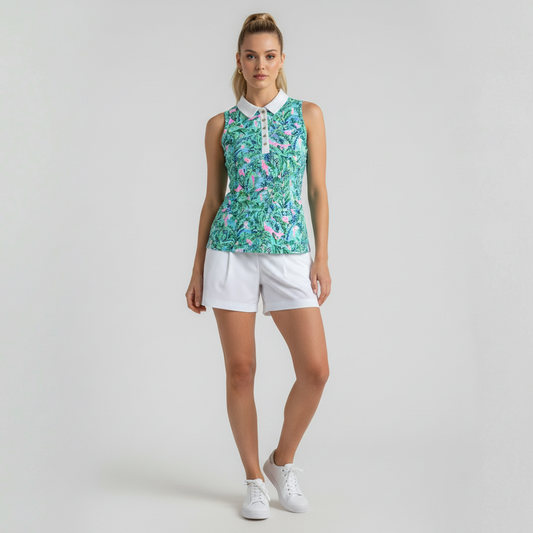 Model wearing a Lynn's Closet Boutique sleeveless polo with a blue and green tropical print and white collar