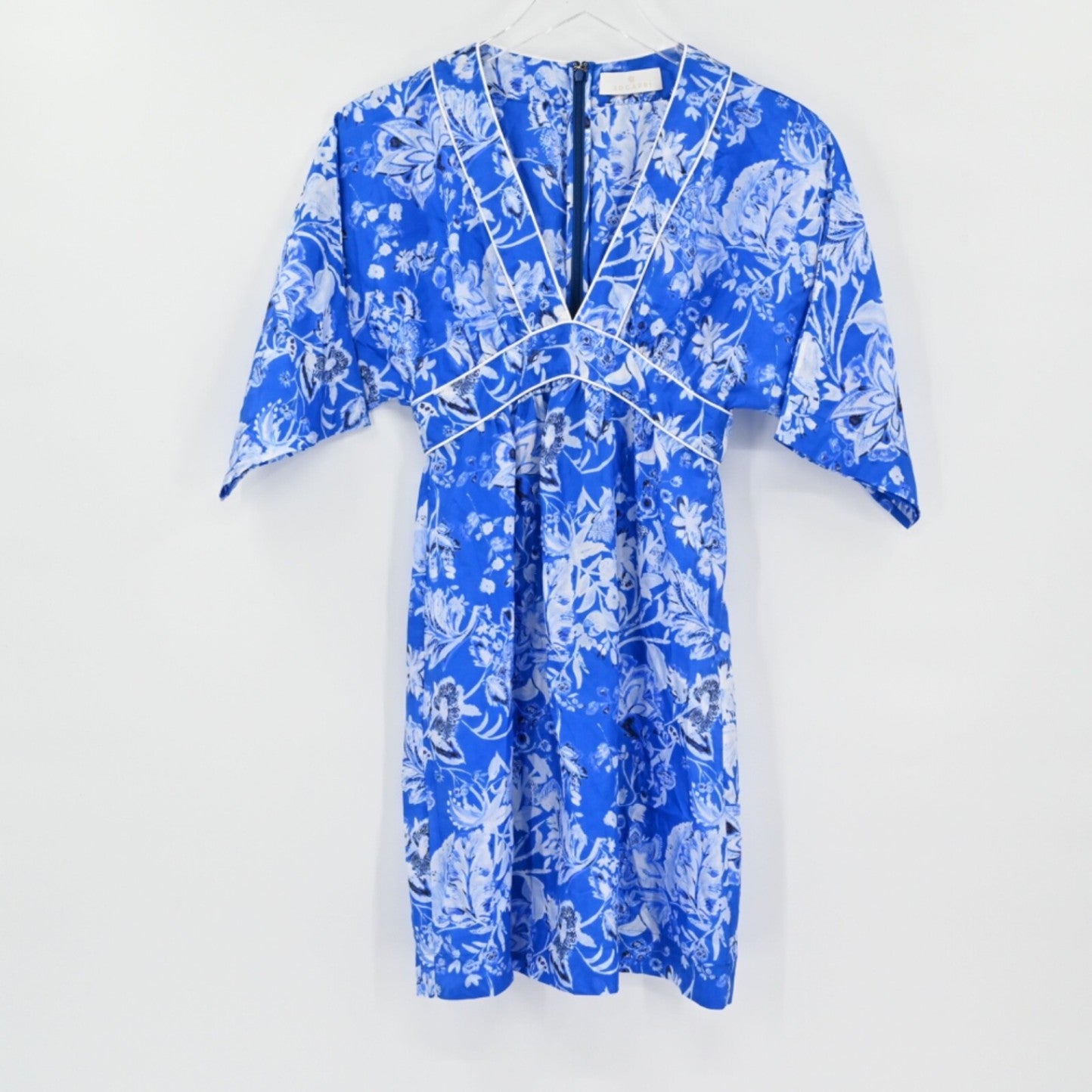 Lynn's Closet Boutique Socapri blue and white floral silk V-neck dress with white piping detail