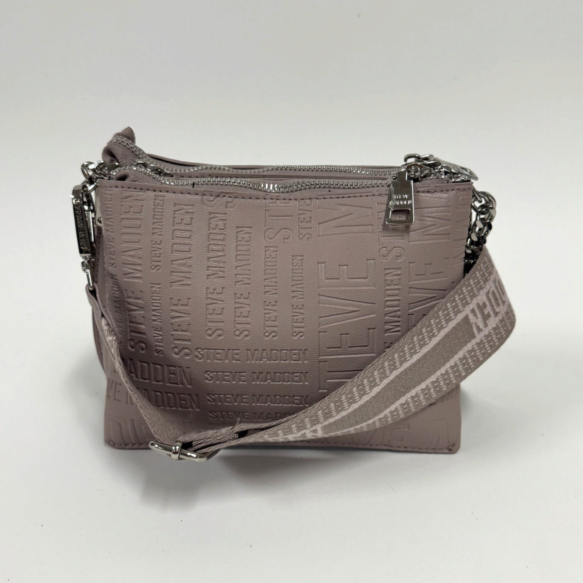 Lynn's Closet Boutique Steve Madden taupe crossbody bag with embossed logo pattern and silver-tone hardware