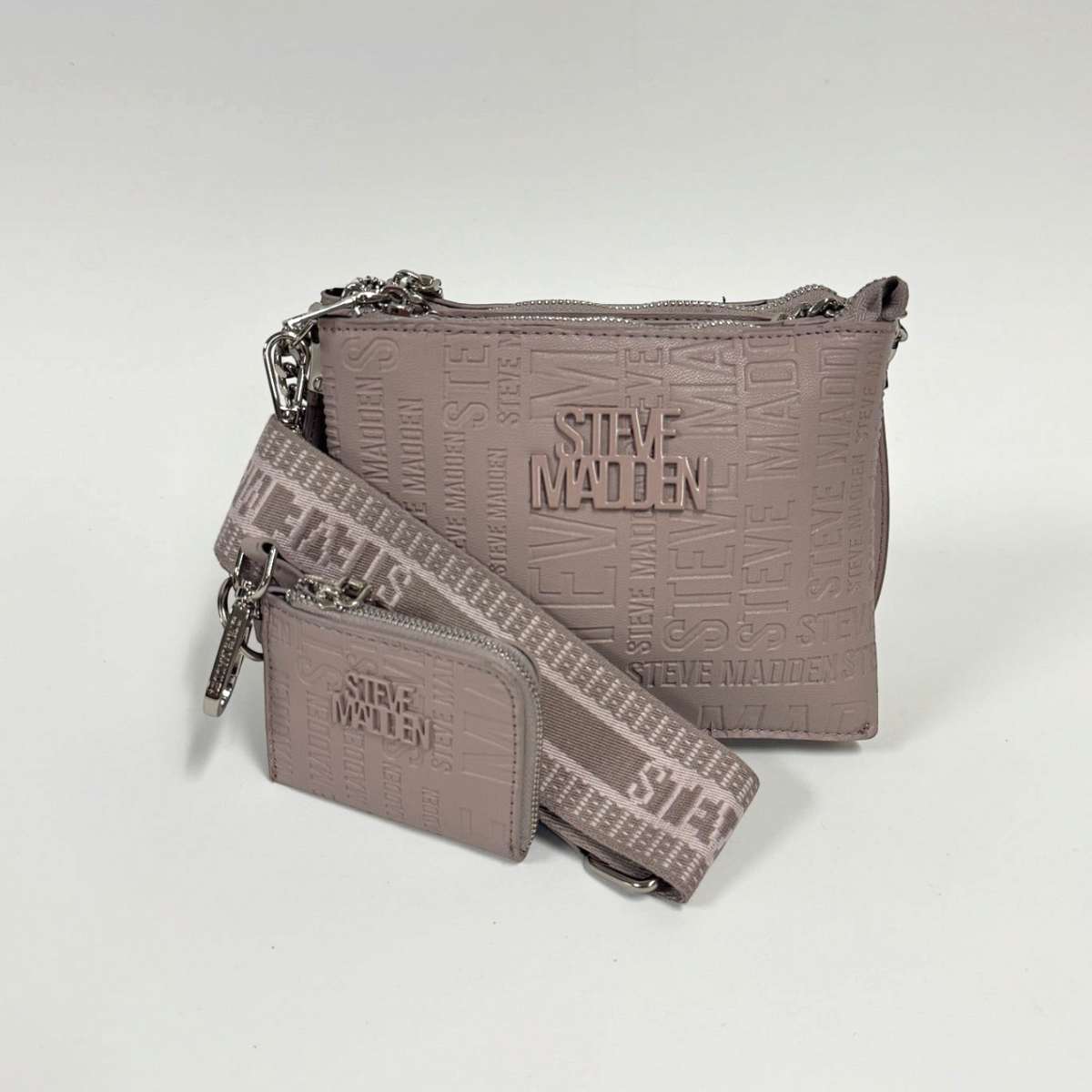 Lynn's Closet Boutique taupe Steve Madden Bvice crossbody bag with embossed logo, silver hardware, and coin purse.