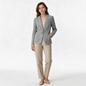 Lynn's Closet Boutique Tommy Hilfiger gray knit blazer with white piping worn by a model with beige trousers