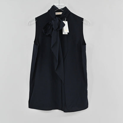 Lynn's Closet Boutique Tory Burch navy sleeveless top featuring a sophisticated tie-neck bow detail on a hanger.