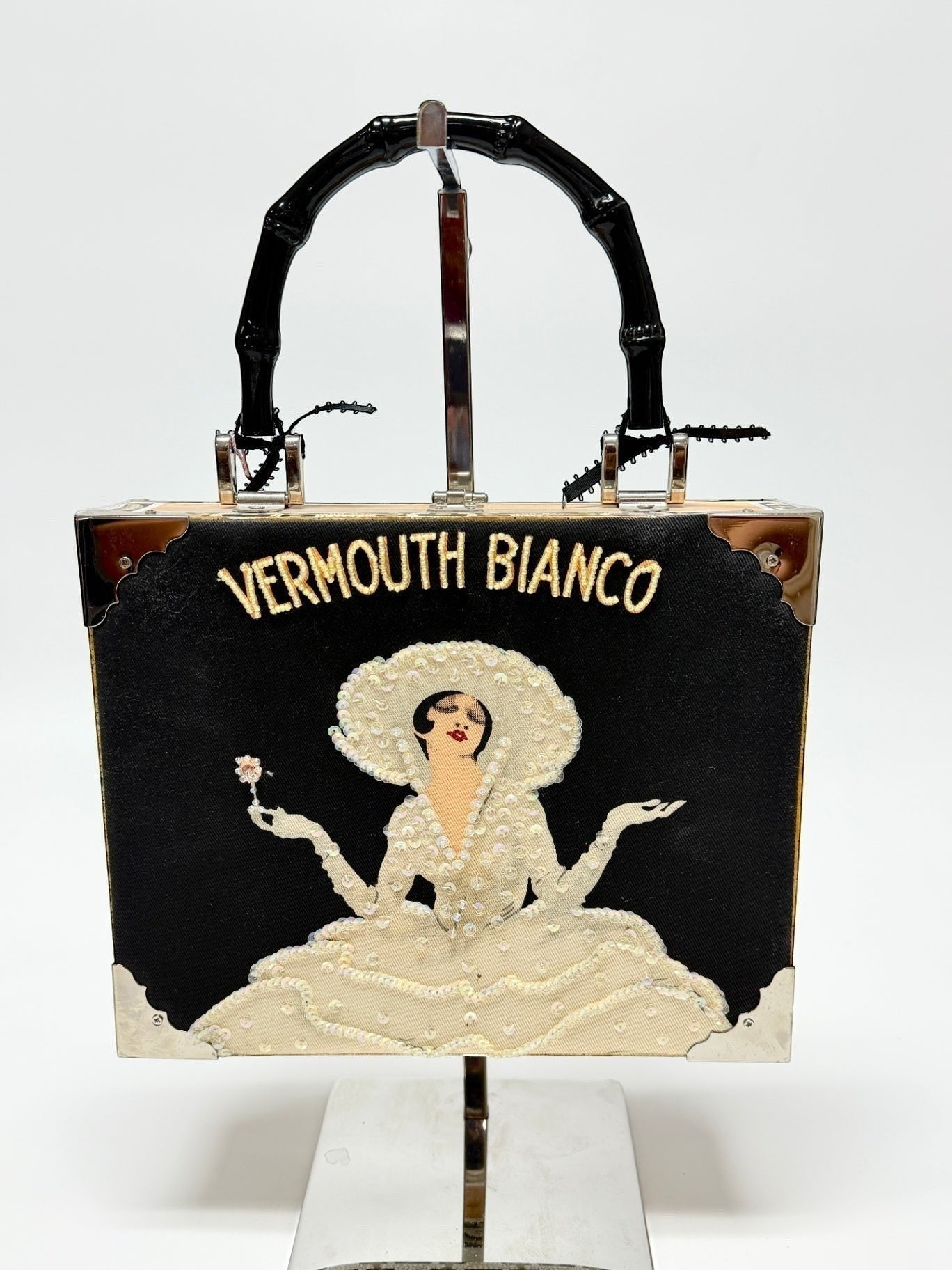 Lynn's Closet Boutique Braciano Vermouth Bianco cigar box purse with beaded woman illustration and bamboo handle.