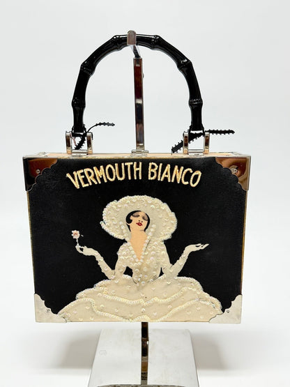 Lynn's Closet Boutique Braciano Vermouth Bianco cigar box purse with beaded woman illustration and bamboo handle.