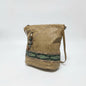Lynn's Closet Boutique vintage 80s tan leather tote bag with green snakeskin trim and decorative turquoise charm.