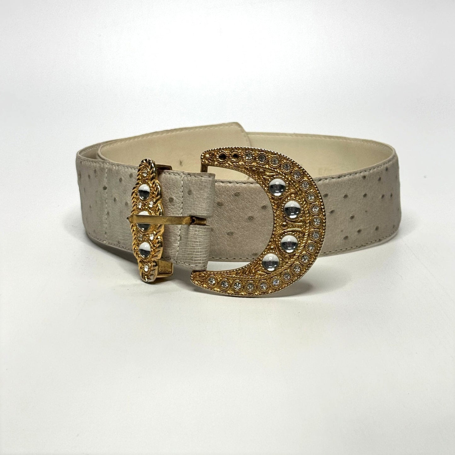 Lynn's Closet Boutique vintage beige ostrich-embossed belt with an oversized gold crescent buckle and clear crystals.