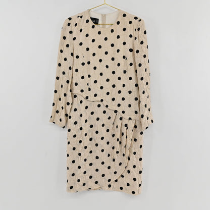 Lynn's Closet Boutique vintage Louis Feraud cream dress with black polka dots, textured fabric, and drop-waist detail.