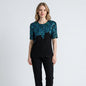 Lynn's Closet Boutique vintage 80s black silk top with iridescent blue and green sequin patterns and scalloped hem