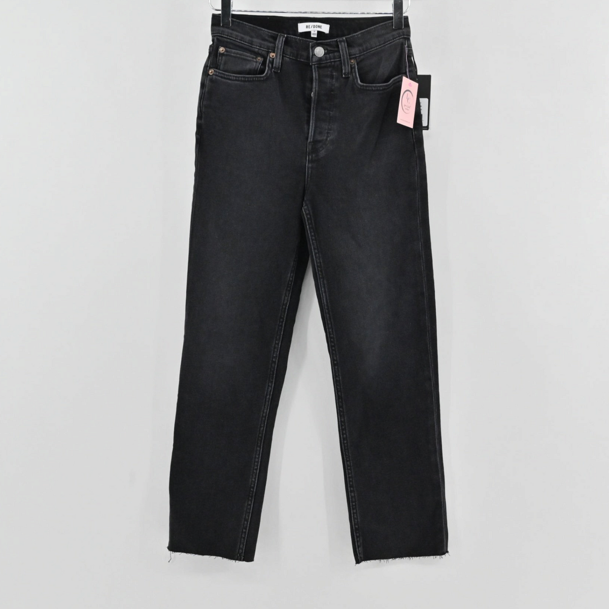 Lynn's Closet Boutique Re/Done 70's Stove Pipe jeans in washed black denim with a high-rise and raw cropped hem.