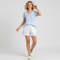Lynn's Closet Boutique white cotton V-neck short sleeve tee with blue turtle print, size XL.