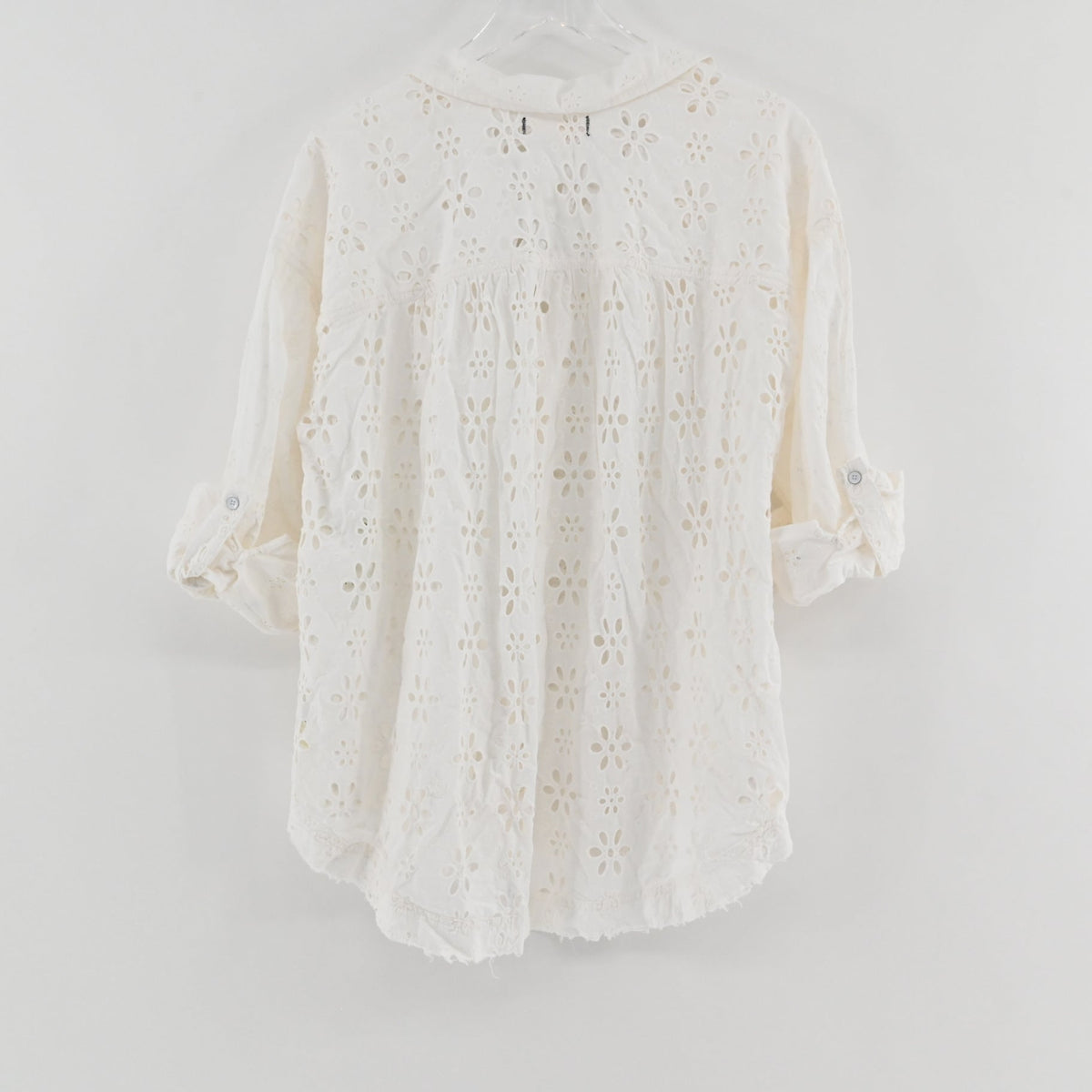 Lynn's Closet Boutique white Free People Mae eyelet button-down shirt with long sleeves and relaxed fit, back view