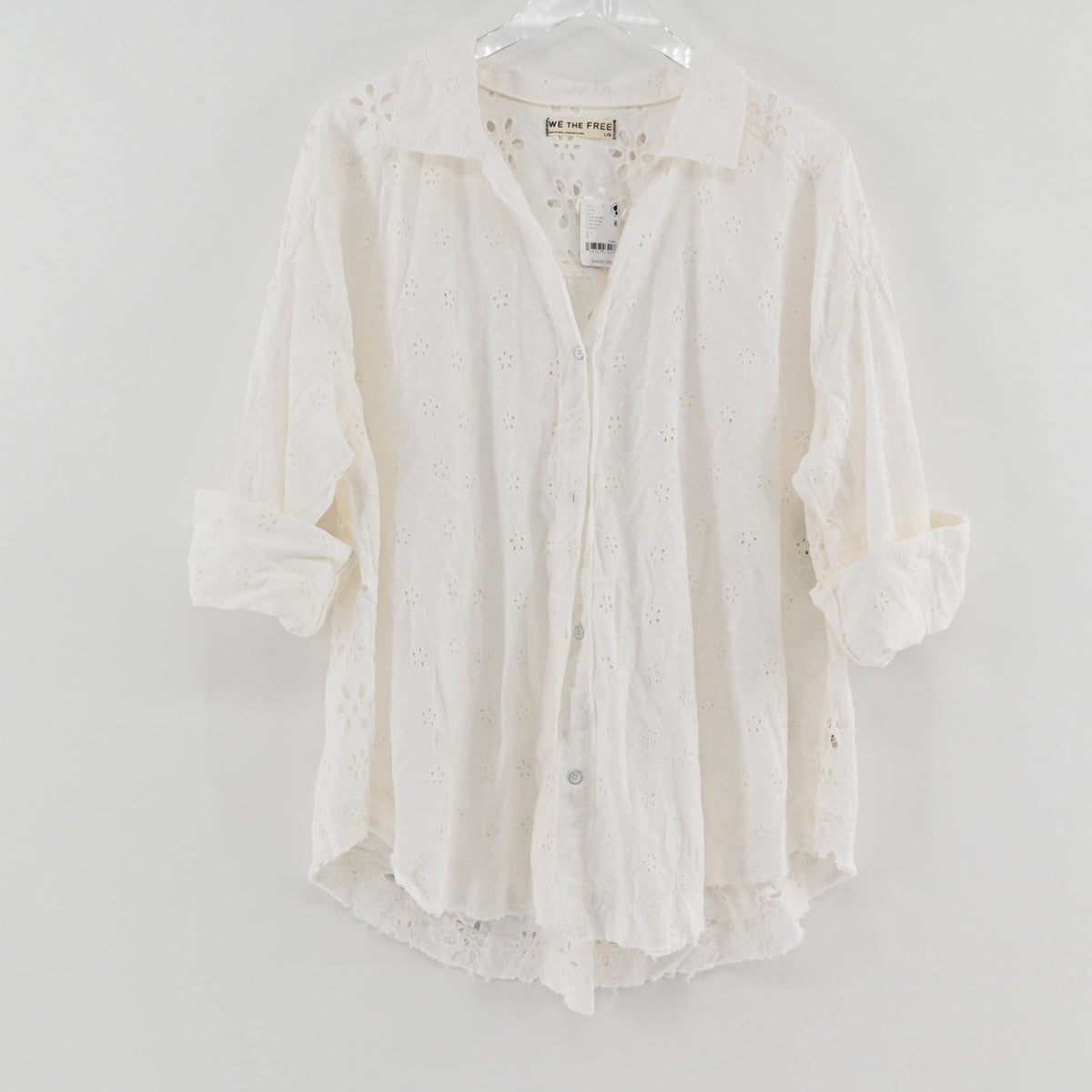 Lynn's Closet Boutique white Free People Mae eyelet button-down shirt with long sleeves and relaxed fit