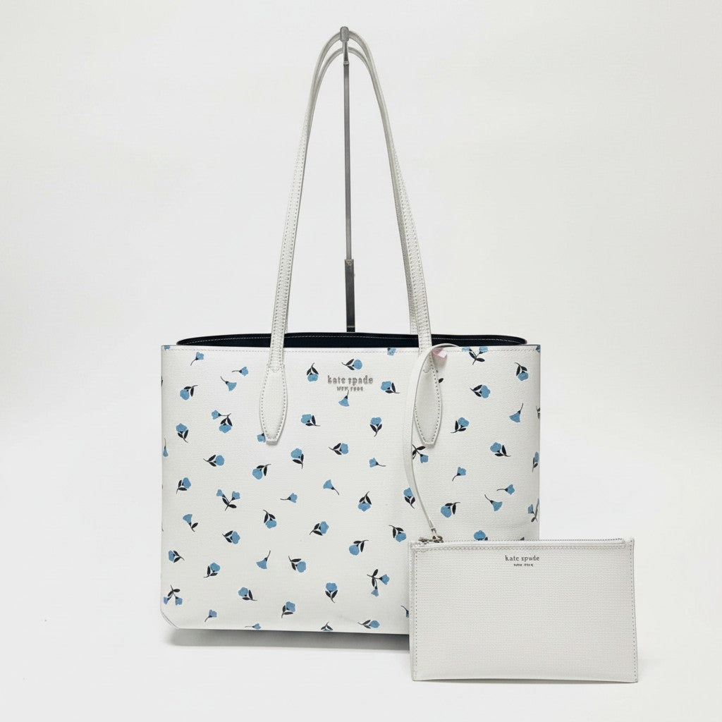 Lynn's Closet Boutique Large white tote bag with a blue floral print and matching pouch. Leather.