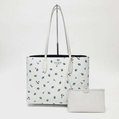 Lynn's Closet Boutique Large white tote bag with a blue floral print and matching pouch. Leather.
