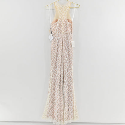 Lynn's Closet Boutique Glow Colors white floor-length lace gown with racerback and leaf-patterned overlay on hanger