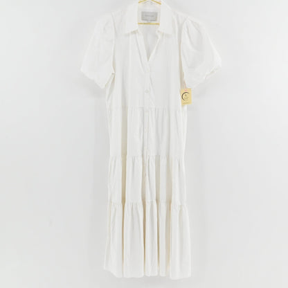 Lynn's Closet Boutique white midi tiered dress with a collared neckline, button-down front, and puff sleeves.