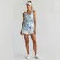 Lynn's Closet Boutique white sleeveless workout tank with blue and green floral print, racerback, size M.