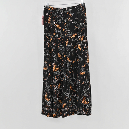 Lynn's Closet Boutique Zadig & Voltaire black midi skirt with orange and white floral print and side slit