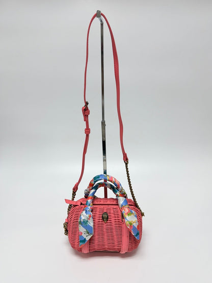 Lynn's Closet Boutique Kurt Geiger coral woven basket Boston bag with eagle emblem and strawberry print scarf handle.